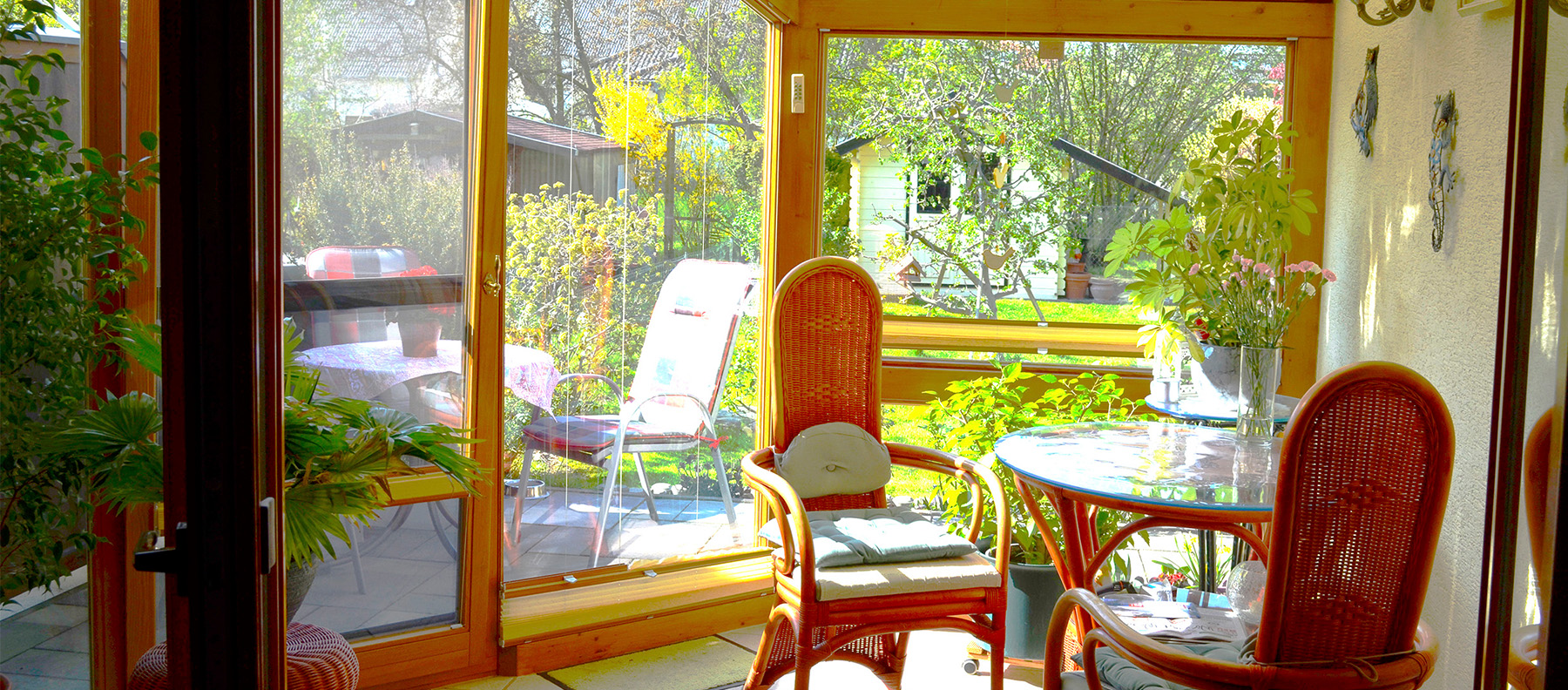 Wintergarten mit Gartenblick